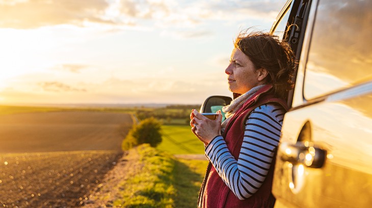 woman-by-van-in-field.jpg