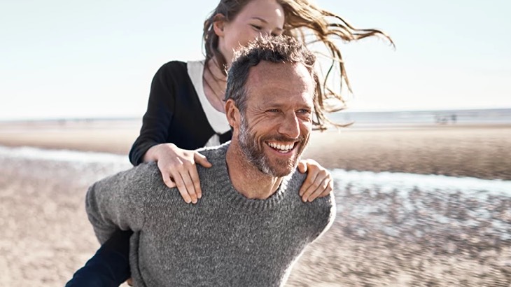 Man and boy on beach