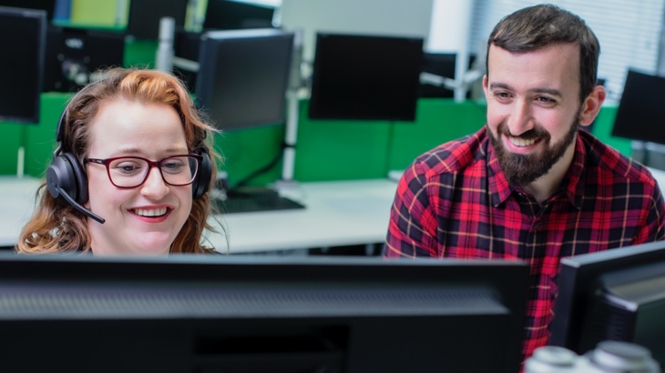 Smiling work colleagues