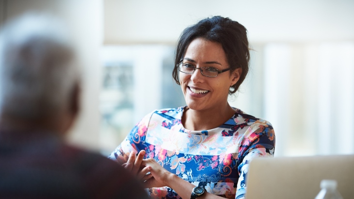 A woman smiling