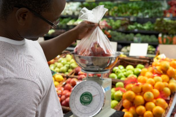 Weighing fruit at the grocers