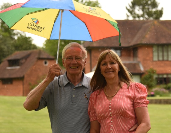 John and June with umbrella